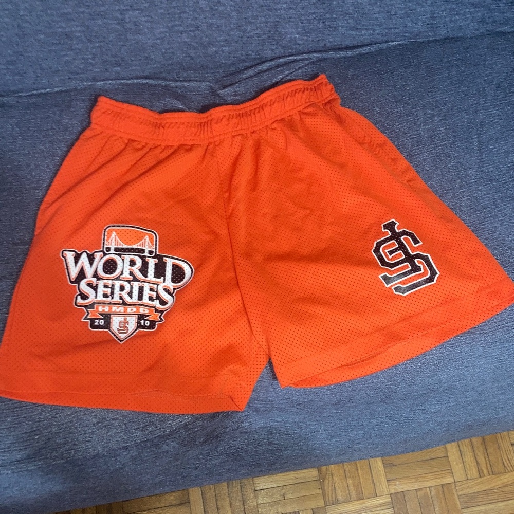 Men's Orange Athletic Shorts with Bold Design